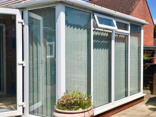 vertical blinds - conservatory blinds - in hereford - slats - wide window outside