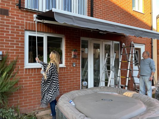 INT300 Cardiff patio awnings installed colour grey high quality fabric