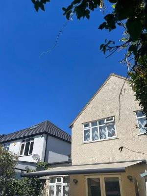 Retractable Awnings Electric and Manual Motorised colour grey and cream Installation and fitting service by Intelroll front in Watford London 2
