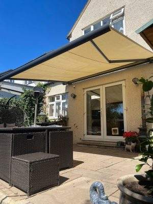 Retractable Awnings Electric and Manual Motorised colour grey and cream Installation and fitting service by Intelroll front in Watford London 3