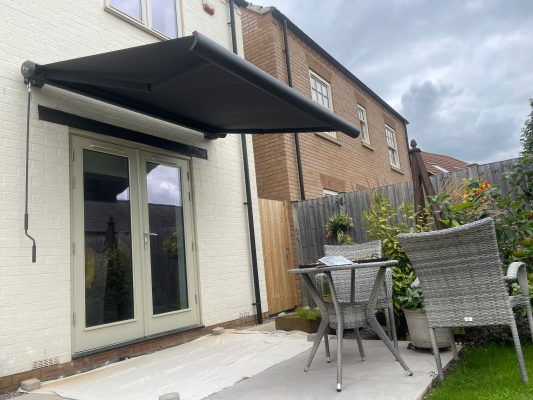 Patio Canopy Intelroll Awning UK retractable manual shading LD9