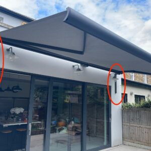 INT 100 Standard Wall bracket spreader bracket on INtelroll Awning marked with red circle