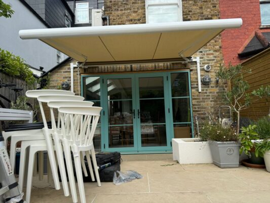 Intelroll L Shape bracket installed on awning console Grey- 2026-04-01 at 17.00.20 white