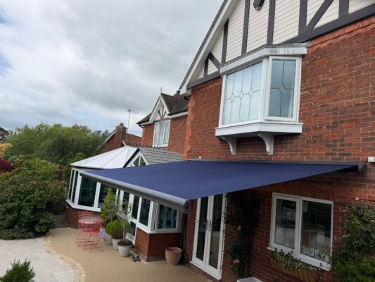 2 GREENACRES TEWKESBURY GL20 6JD INT500 CASSETTE OPEN MINARO BLUE AWNING WINDOW VIEW 21ST MAY 2026