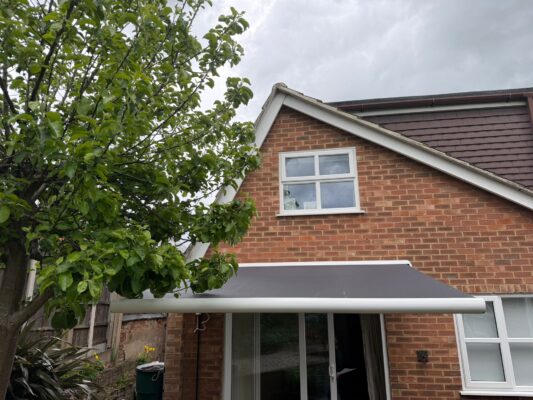 MEETING STREET LE12 8EX INT 500 OPENED AWNING GREY COLOUR WITH TREE VIEW 18TH MAY 2026