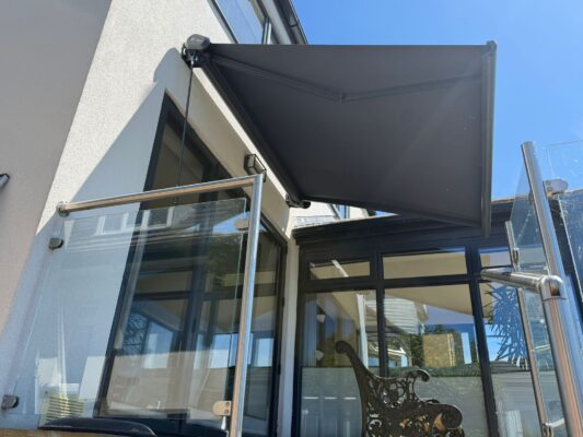 RYECROFT BEECH STREET BD16 1EX OPENED AWNING INT500 GREY COLOUR BALCONY 24TH MAY 2026.