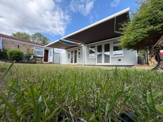Home - IntelRoll Retractable Awnings - UK Stock - Fitting and Installation 263 ST GOERGES DRIVE S50 05S 2 X INT 500 OPEN AWNING S GREY COLOUR IN GARDEN 8TH JUNE 2026