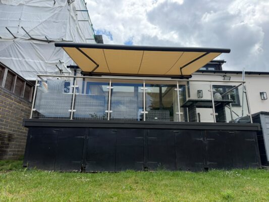 Home - IntelRoll Retractable Awnings - UK Stock - Fitting and Installation 262 HAMBRO AVENUE S56 9NJ INT500 OPENED AWNING BEIGE COLOUR ON PORCH 8TH JUNE 2026